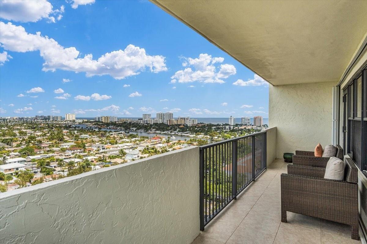 OVERSIZED CORNER UNIT WITH MILLION-DOLLAR OCEAN & INTRACOASTAL VIEWS! This condo feels like a home a