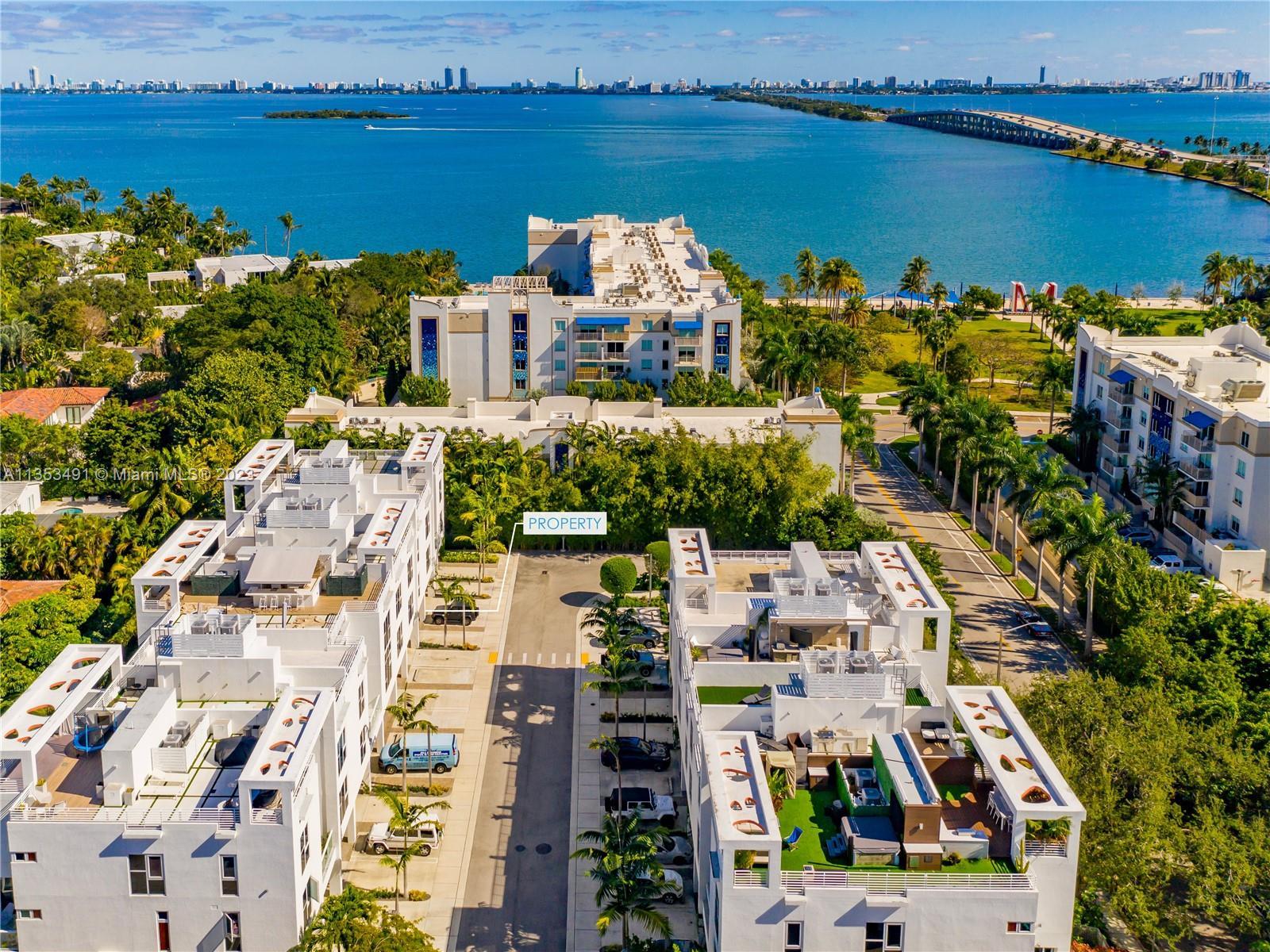 ONE BAY RESIDENCES, a gated residential enclave of 38 modern, multi-story luxury townhouses in the M