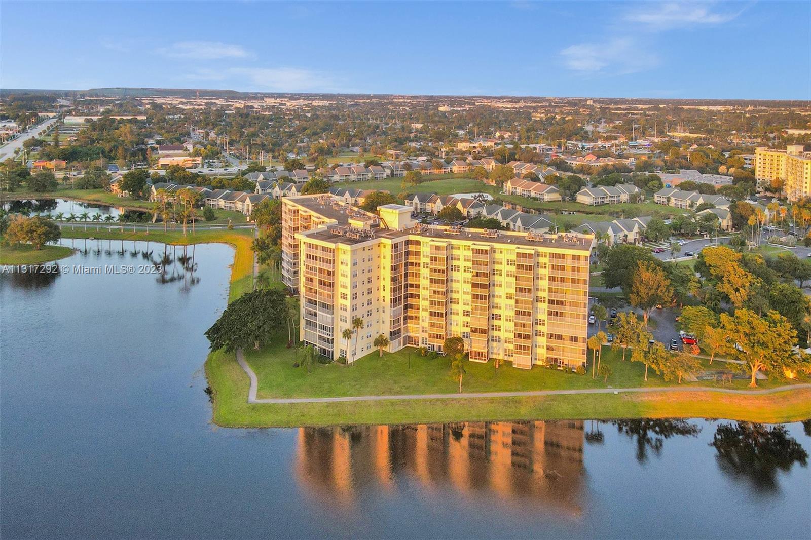 Enjoy picturesque sunsets over the lake view in this expansively large and highly sought after 3/2.5