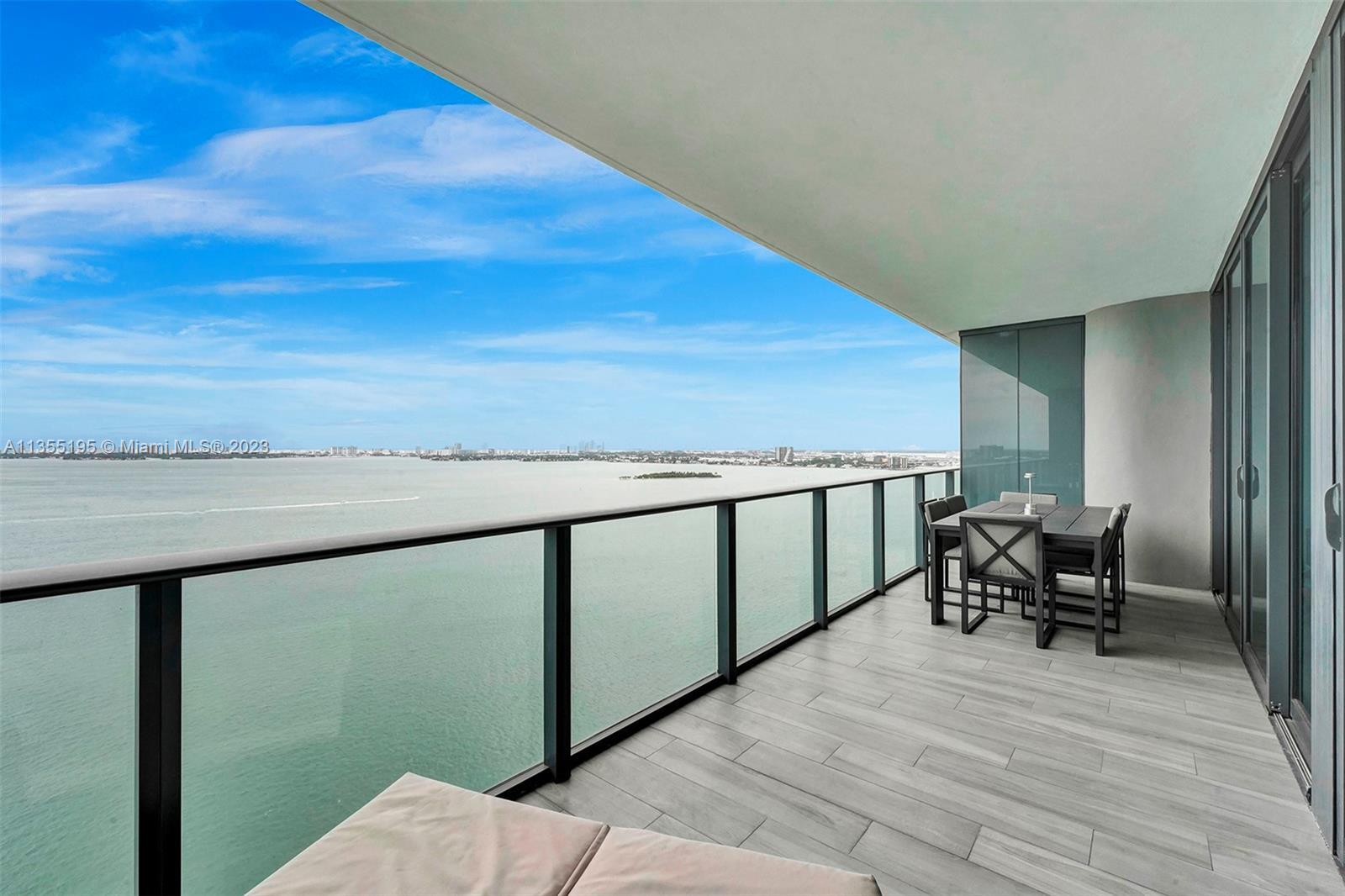 Enjoy one of Miami's best bay views, One Paraiso sits directly on the seawall facing Biscayne Bay. T