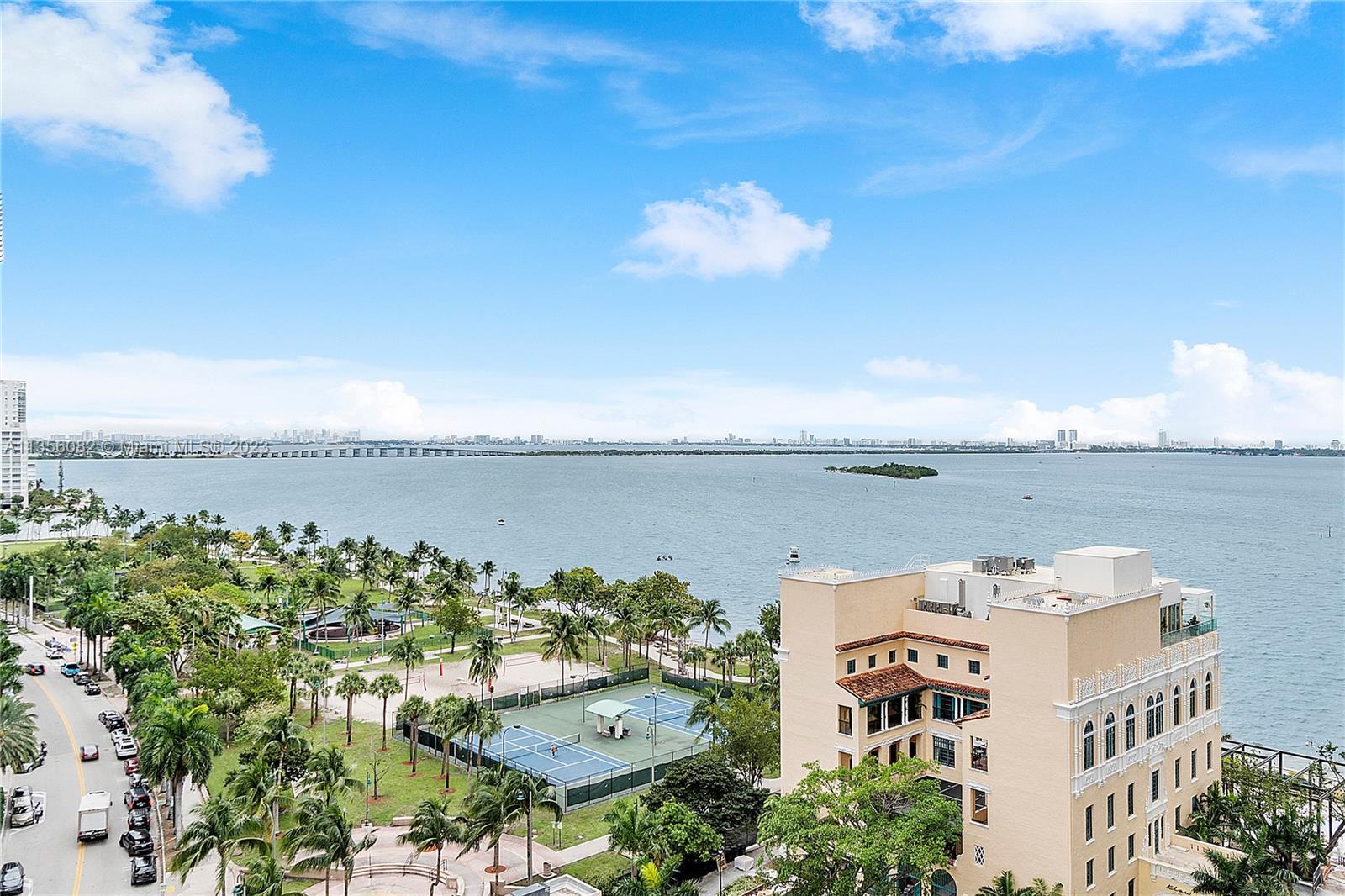 WELCOME TO ONE OF THE MOST SOUGHT AFTER LINES IN THE GRAND!  With stunning views of Biscayne Bay and