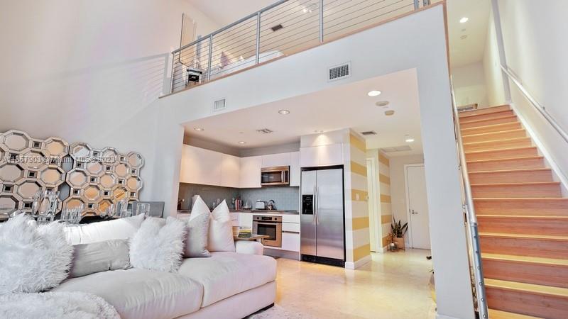 Chic loft apartment at 1050 Brickell in Miami's financial district. Marble tile and bamboo flooring 