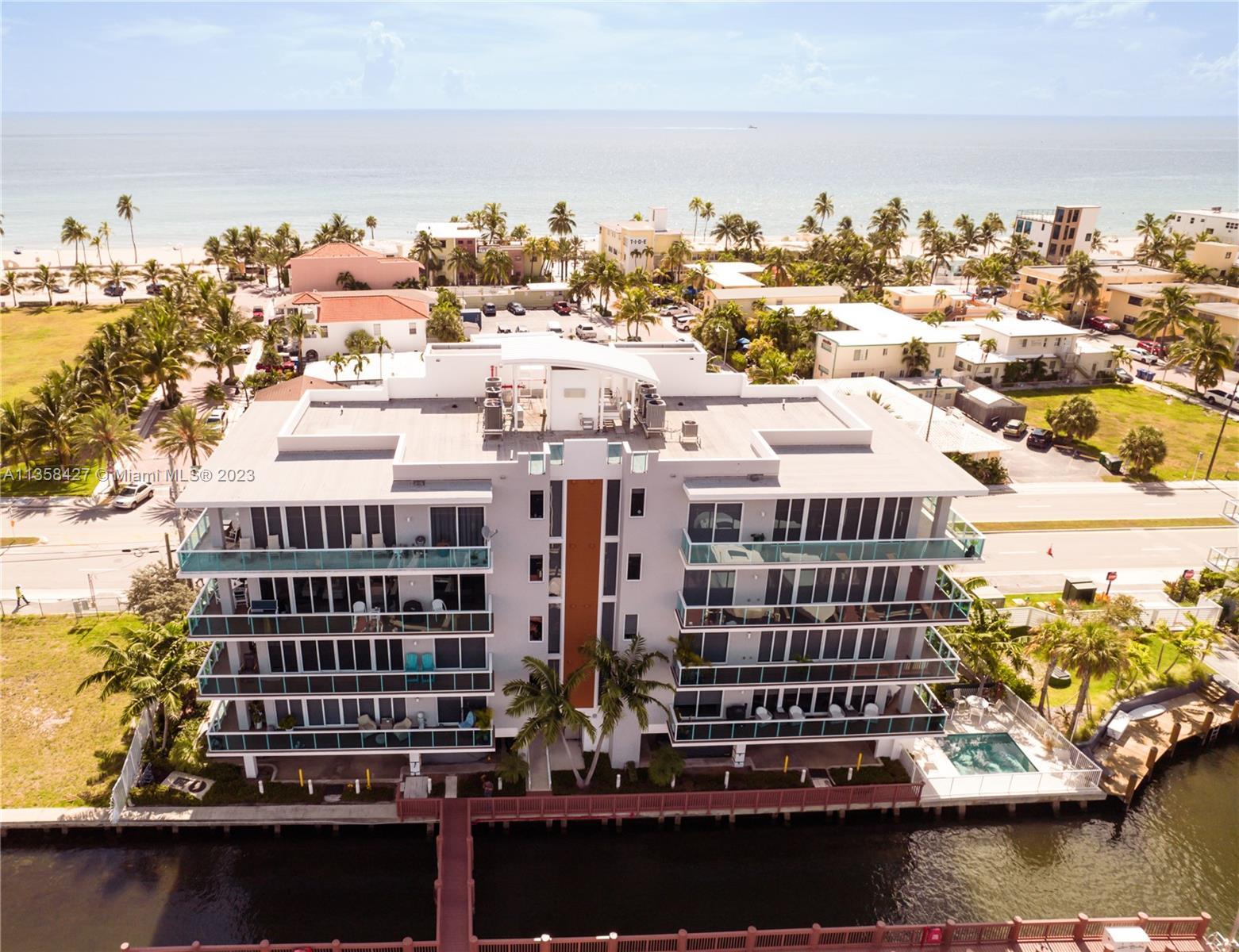 LUXURY WATERFRONT CONDO WITH 60' BOAT SLIP LOCATED IN THE HEART OF HOLLYWOOD BEACH. Sky Harbor is an