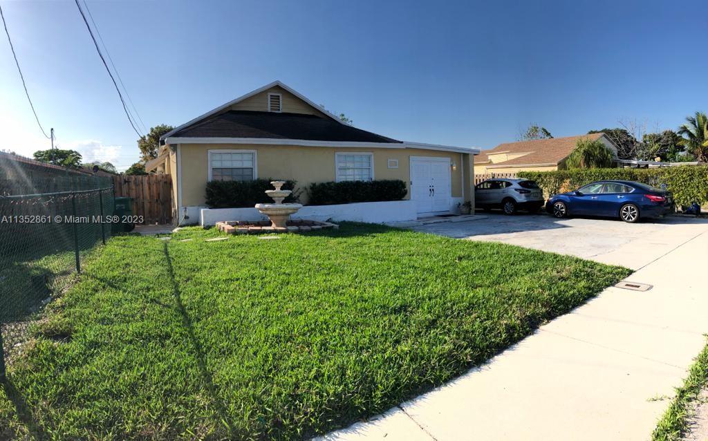 This 4 bedroom/3 bath home is close to 2300 sq. ft. Home is completely fenced. Driveway is for 4+ ca