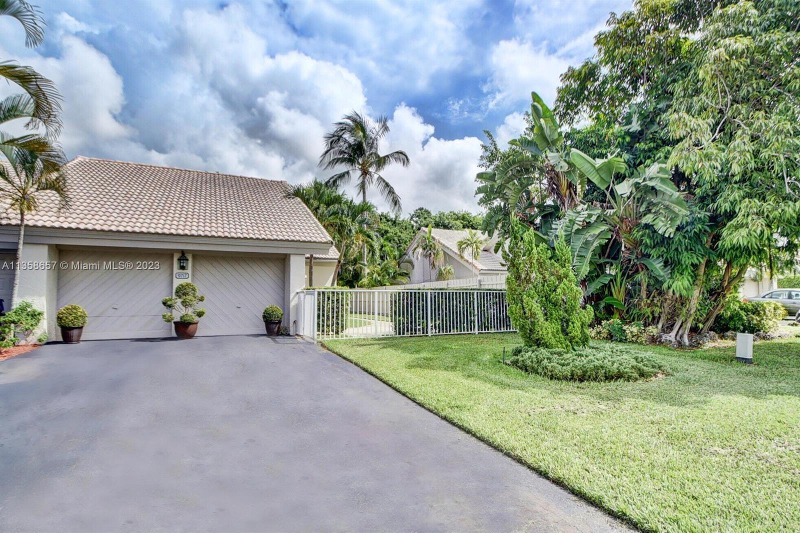 This gated community 3/2 house is a rare find. Located in a gated community with a huge backyard tha