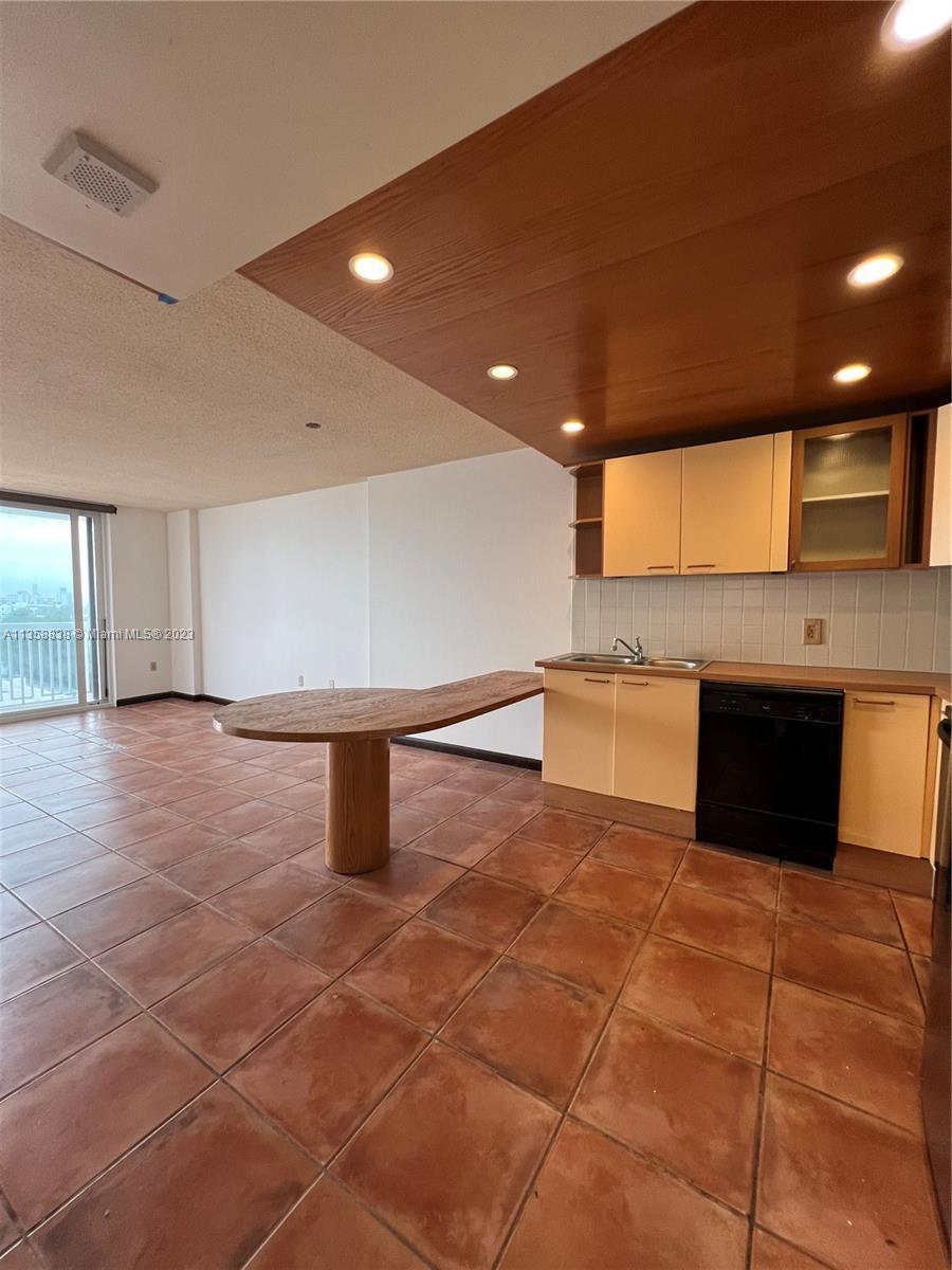 One of the lowest price one bedrooms on Ocean Dr with gated parking. The unit looks west towards Sou