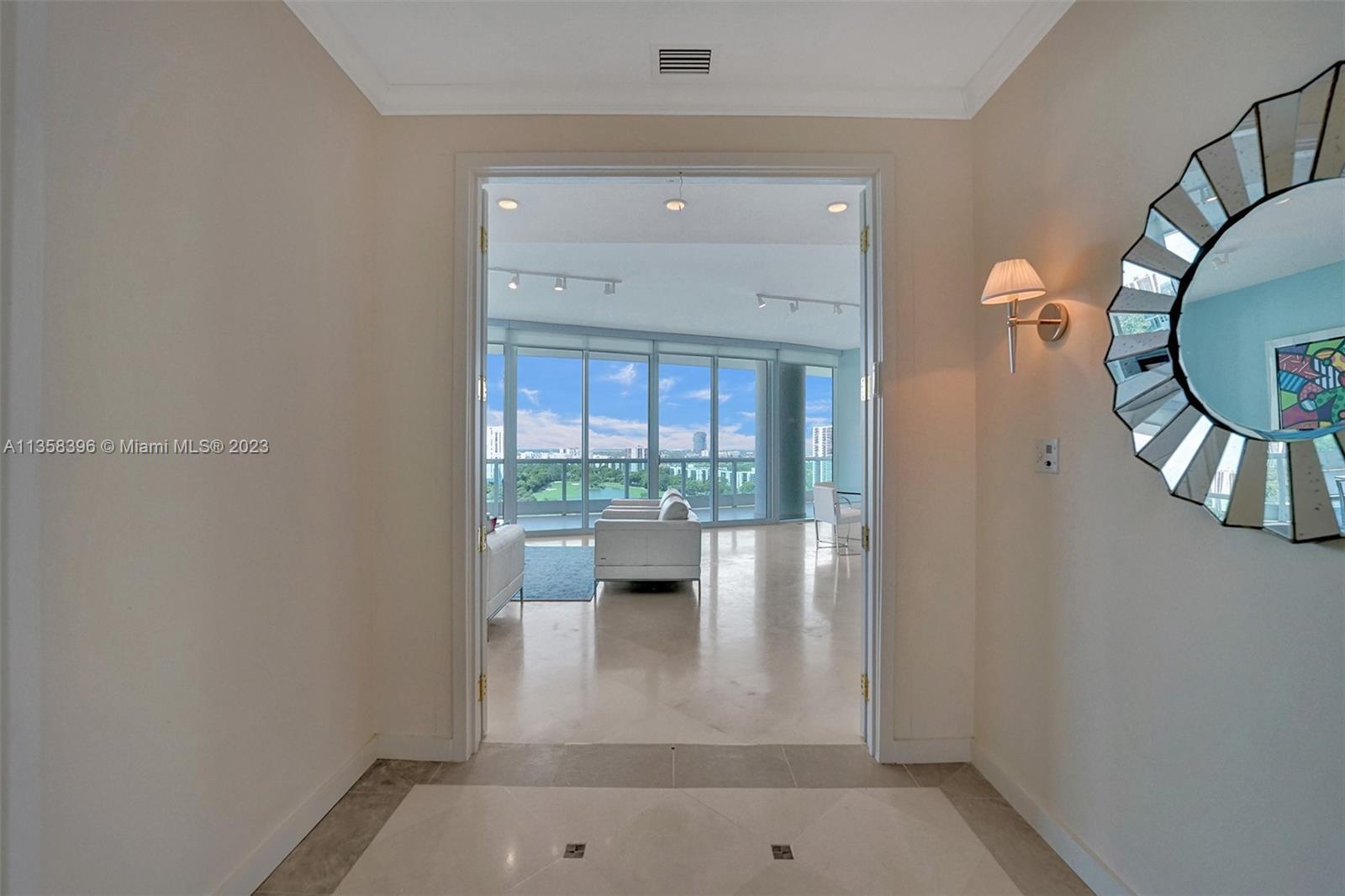 Welcome to the epitome of luxury living at Porto Vita in Aventura! This stunning 2/2.5 bath residenc
