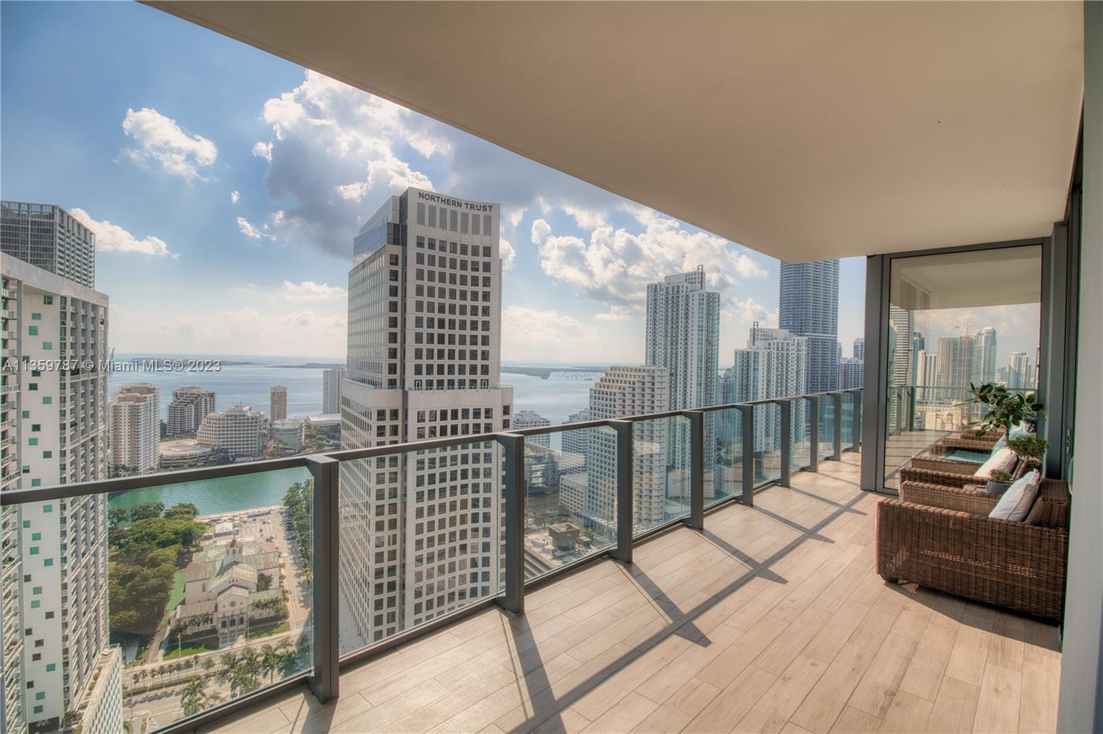 Live Limitlessly in this Contemporary Corner - a spacious corner unit w/ floor to ceiling windows & 