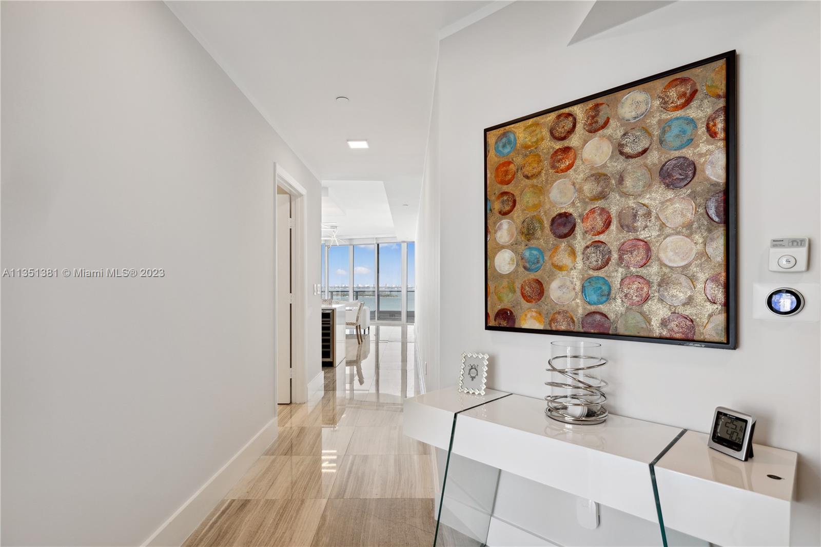 Welcome to this beautiful upgraded direct E water view condominium at Paramount Bay. You will enter 