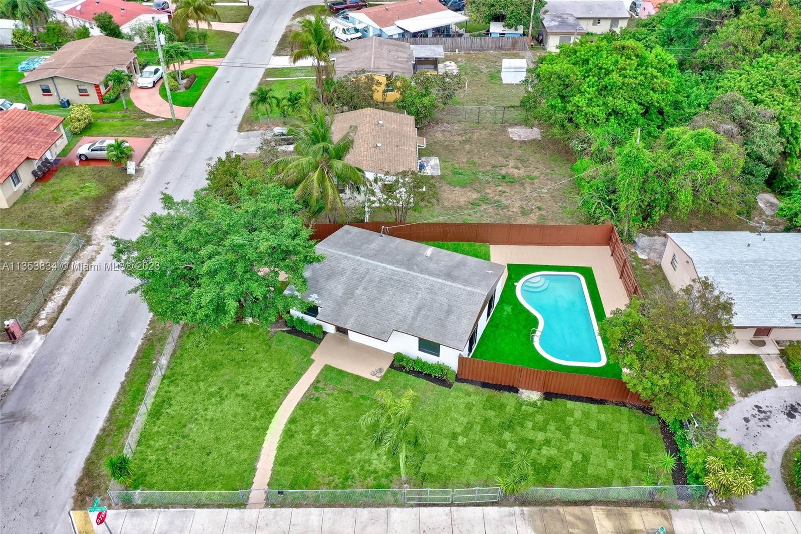 Beautiful remodeled Hollywood Beach 3 Bedroom Home that sits on a fully fenced oversized corner lot 