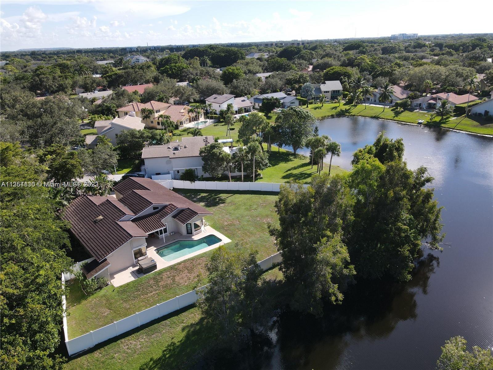 This is a stunning, oversize waterfront & private pool home located in Boca's most desirable neighbo