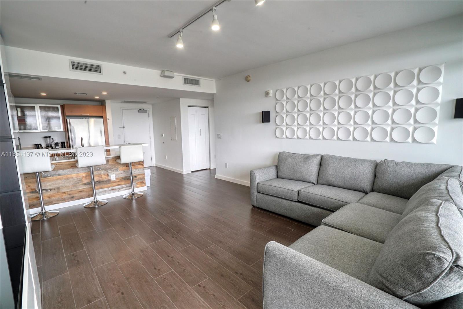 Fall in love with this Ultra-Modern 2 Bed + 2 Bath in the heart of Midtown. 10 Feet high ceilings! W