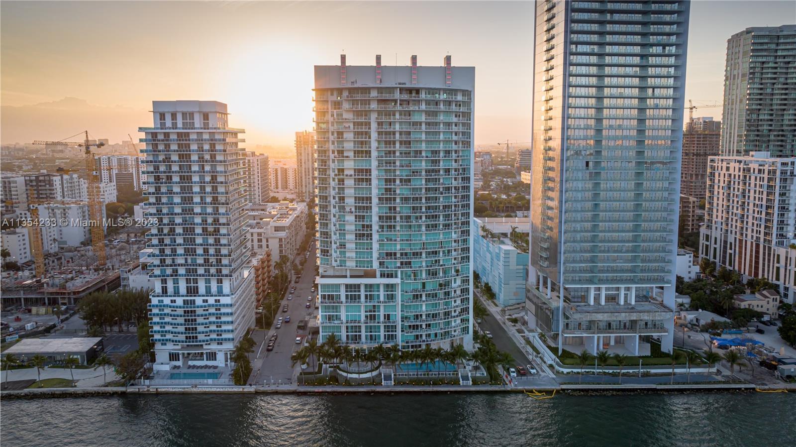 WAKE UP TO BREATHTAKING UNINTERRUPTED VIEWS OF THE BAY AND OCEAN, THIS GORGEOUS 1 BEDROOM AND 1 BATH