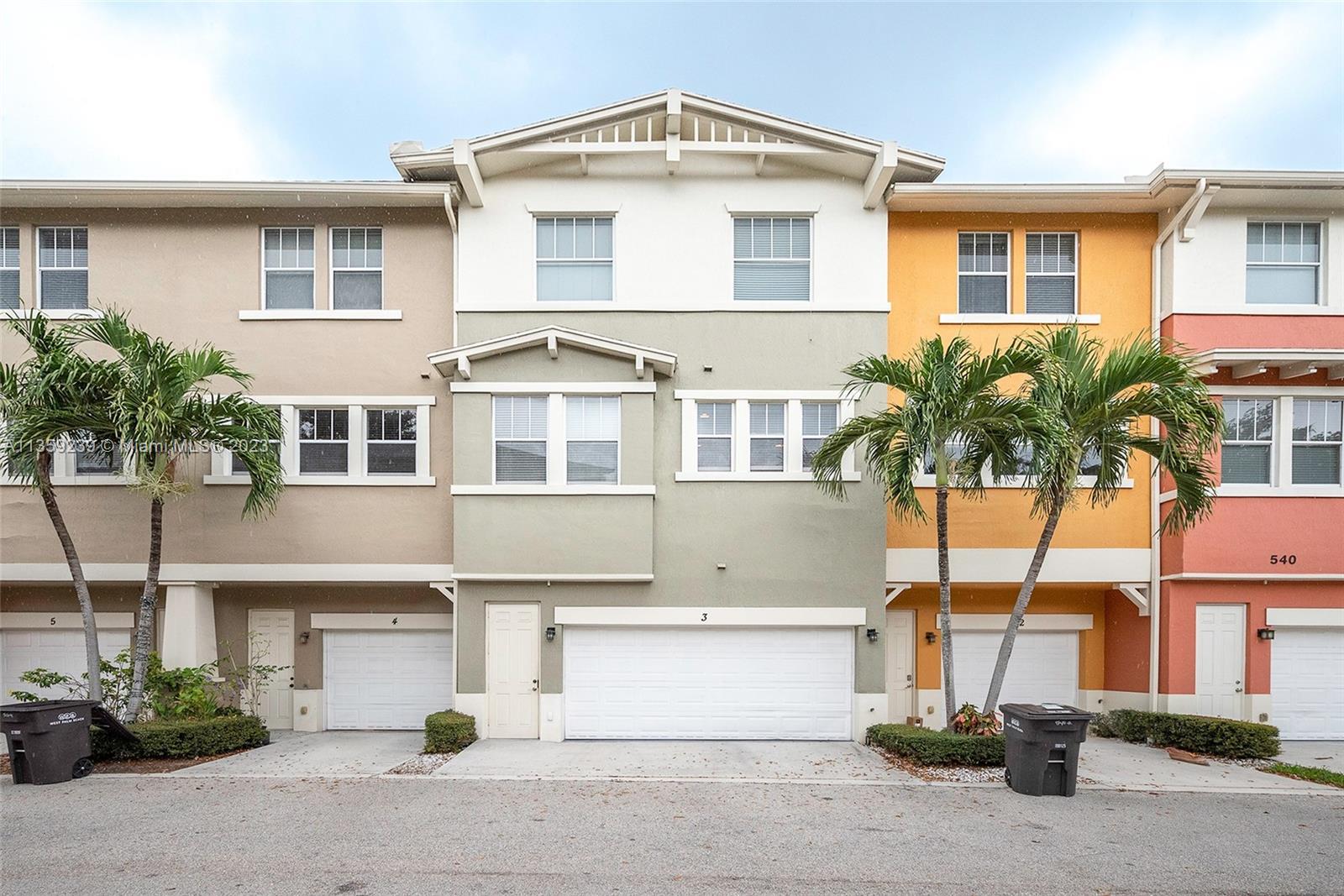 IRRESISTIBLE 3-LEVEL TOWNHOME IN THE EXCLUSIVE GATED COMMUNITY IN THE PRESTIGIOUS CITY OF WEST PALM 