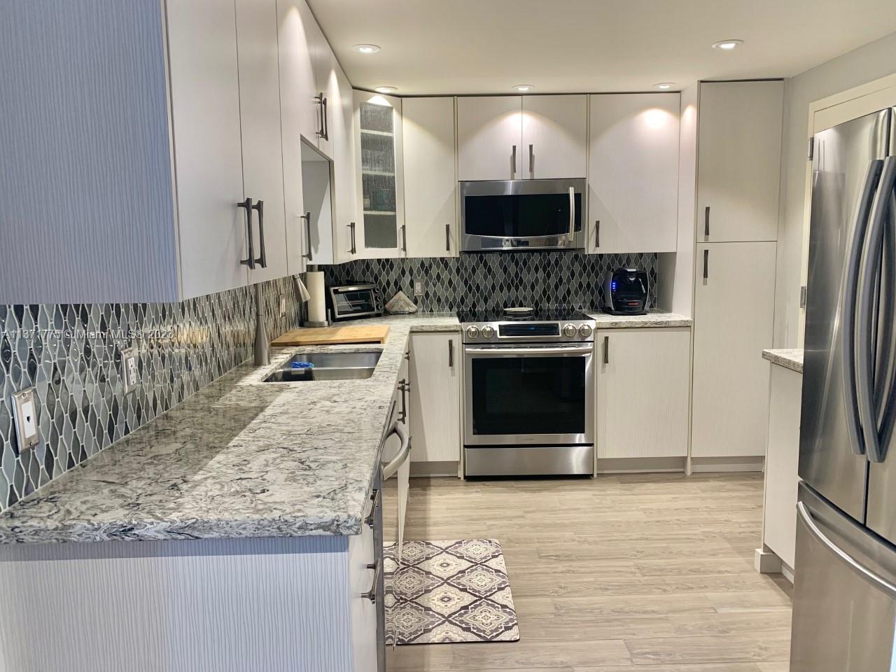 Photo of 427 Golden Isles Dr #8E in Hallandale Beach, FL