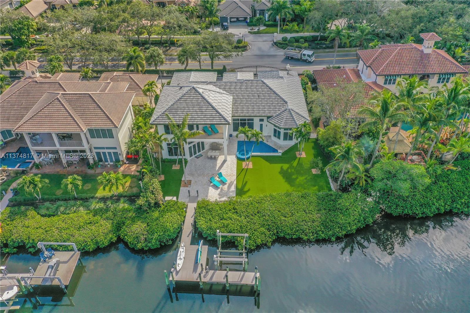 Located in the gated community of The Islands of Jupiter, this waterfront home could be perfect for 