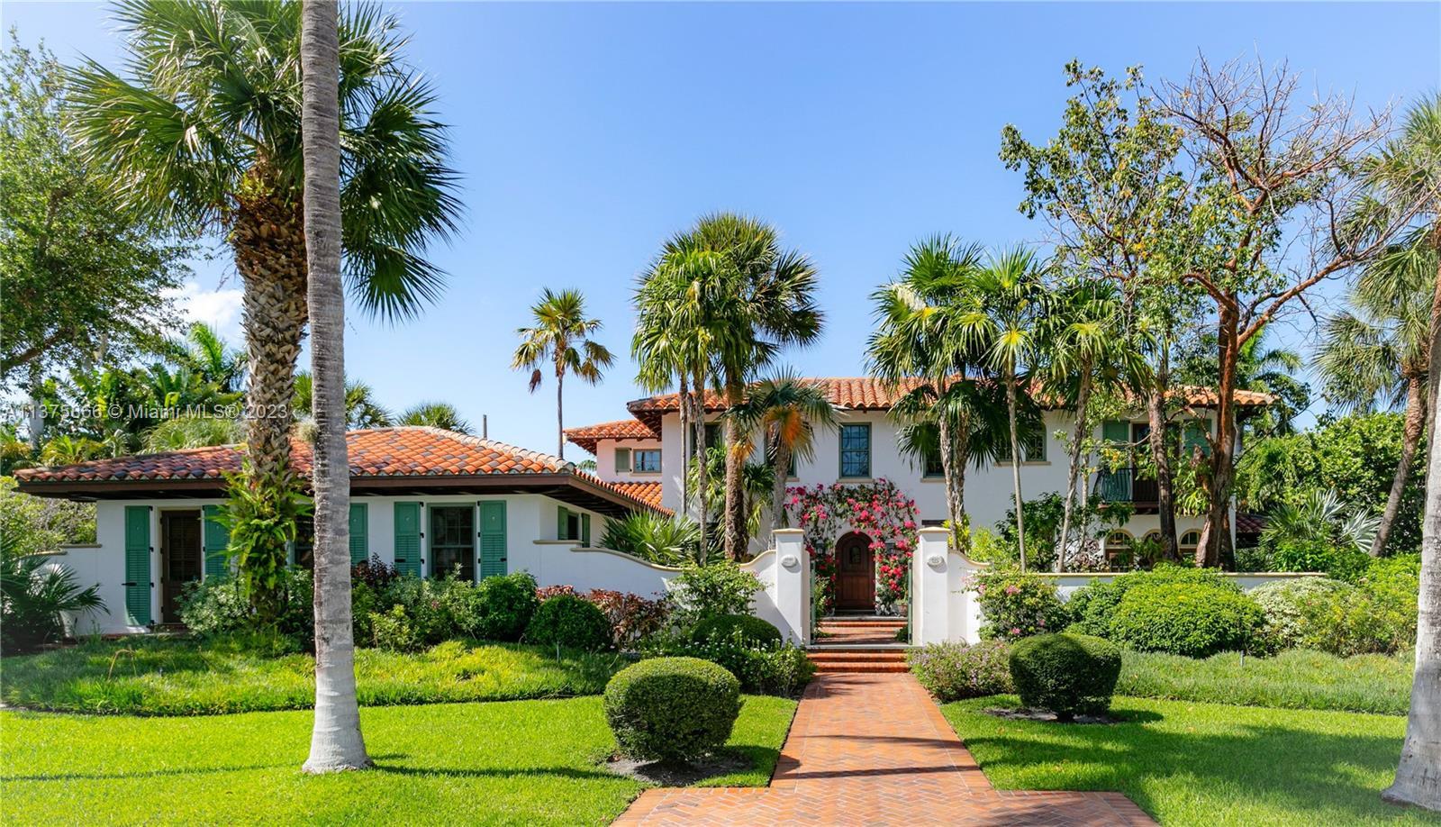 This 2-story Mediterranean revival exudes the charm and warmth typically found in fairytales. The 19