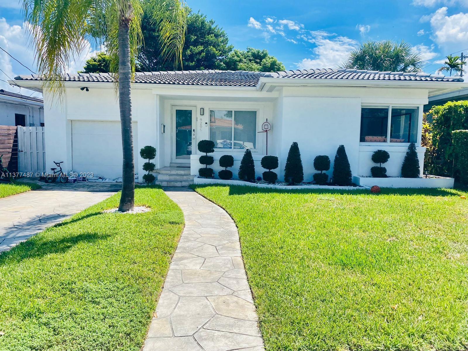 Location, Location, Location! Situated on one of the most coveted blocks in Surfside, this updated h