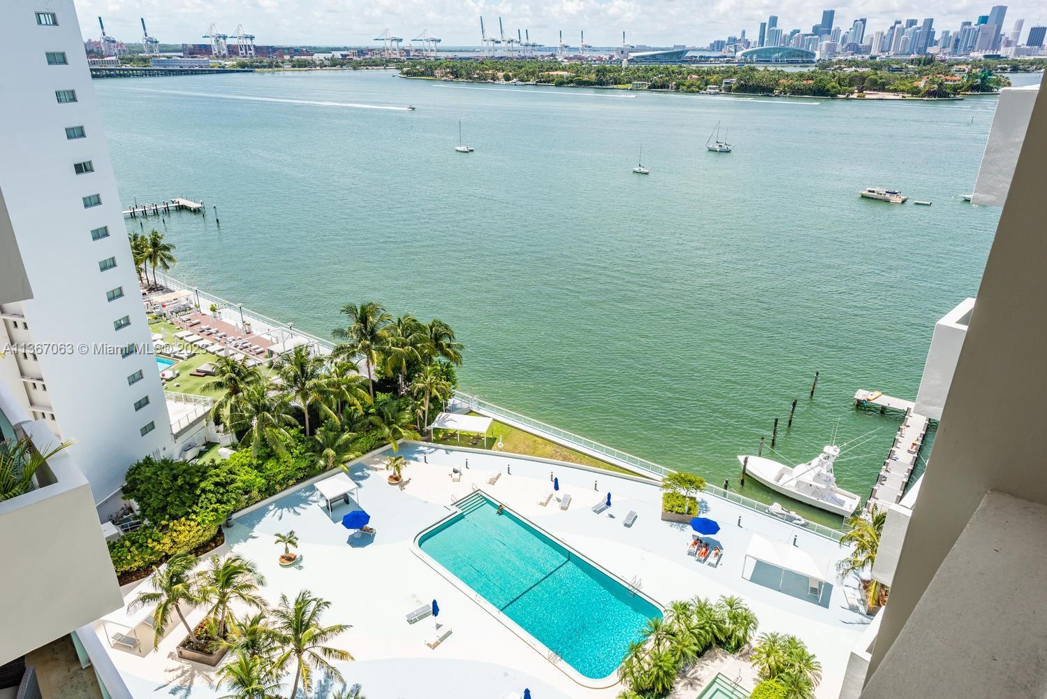 Enjoy spectacular Biscayne Bay, Port of Miami and Downtown views from this bright and beautifully re