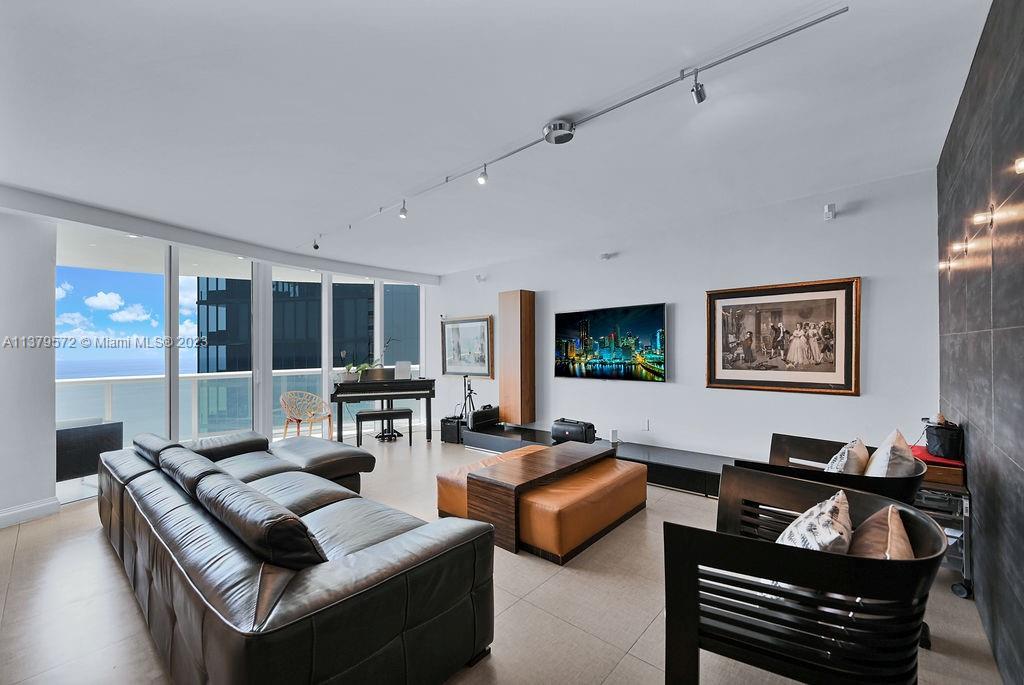 One of a kind beautiful flow through SE corner unit on 38th floor with direct ocean and intercoastal