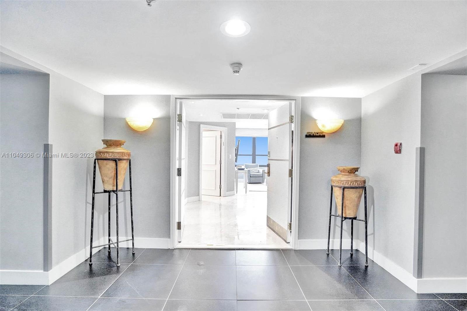 Double doors open into this bright, remodeled & furnished 3BD/3BA penthouse apartment with large bal