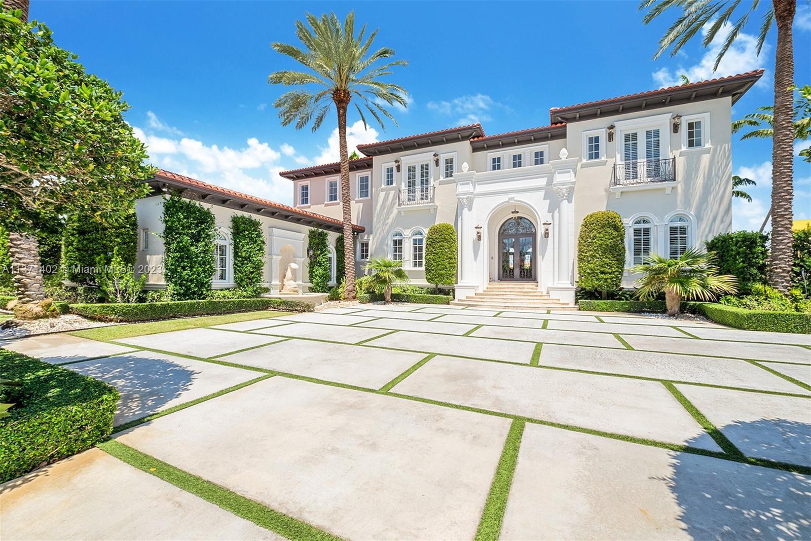 This newer constructed Mediterranean estate is privately located in the prestigious community of Old