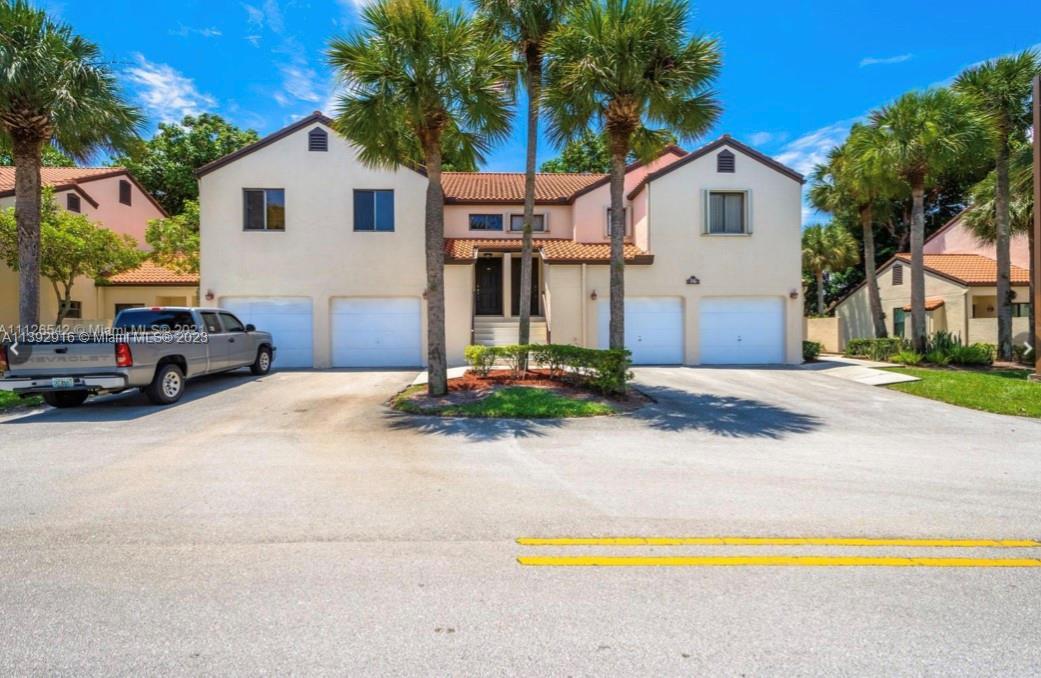Location! This Beautifully maintained townhouse style unit inside the desired and exclusive communit