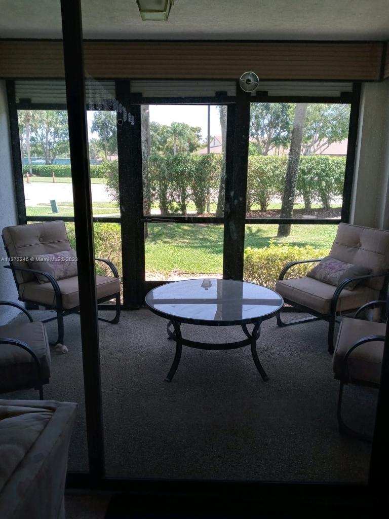 LOCATION LOCATION LOCATION , first floor corner unit directly across from the lovely clubhouse. This