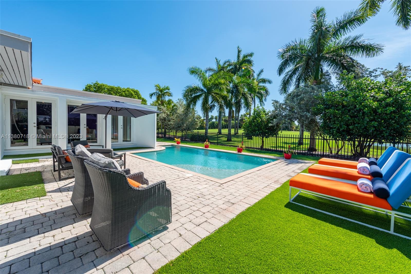 This stunning 3-bed/3-bath Miami Beach home offers breathtaking views of La Gorce golf course. This 