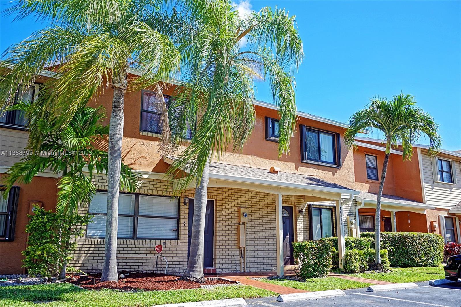 Photo of 10587 NW 8th St #10587 in Pembroke Pines, FL