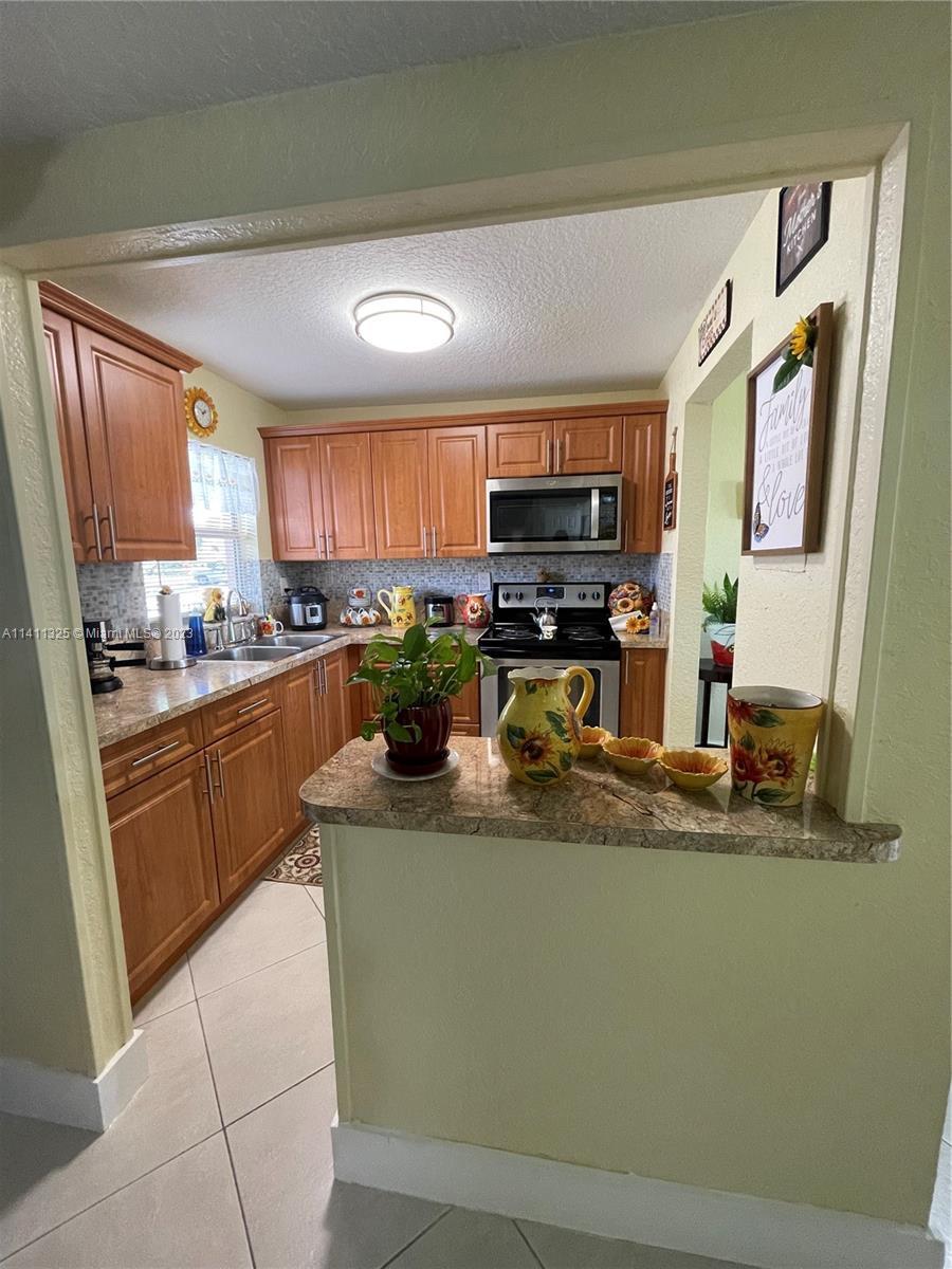 Photo of 9041 Sunrise Lakes Blvd #108 in Sunrise, FL