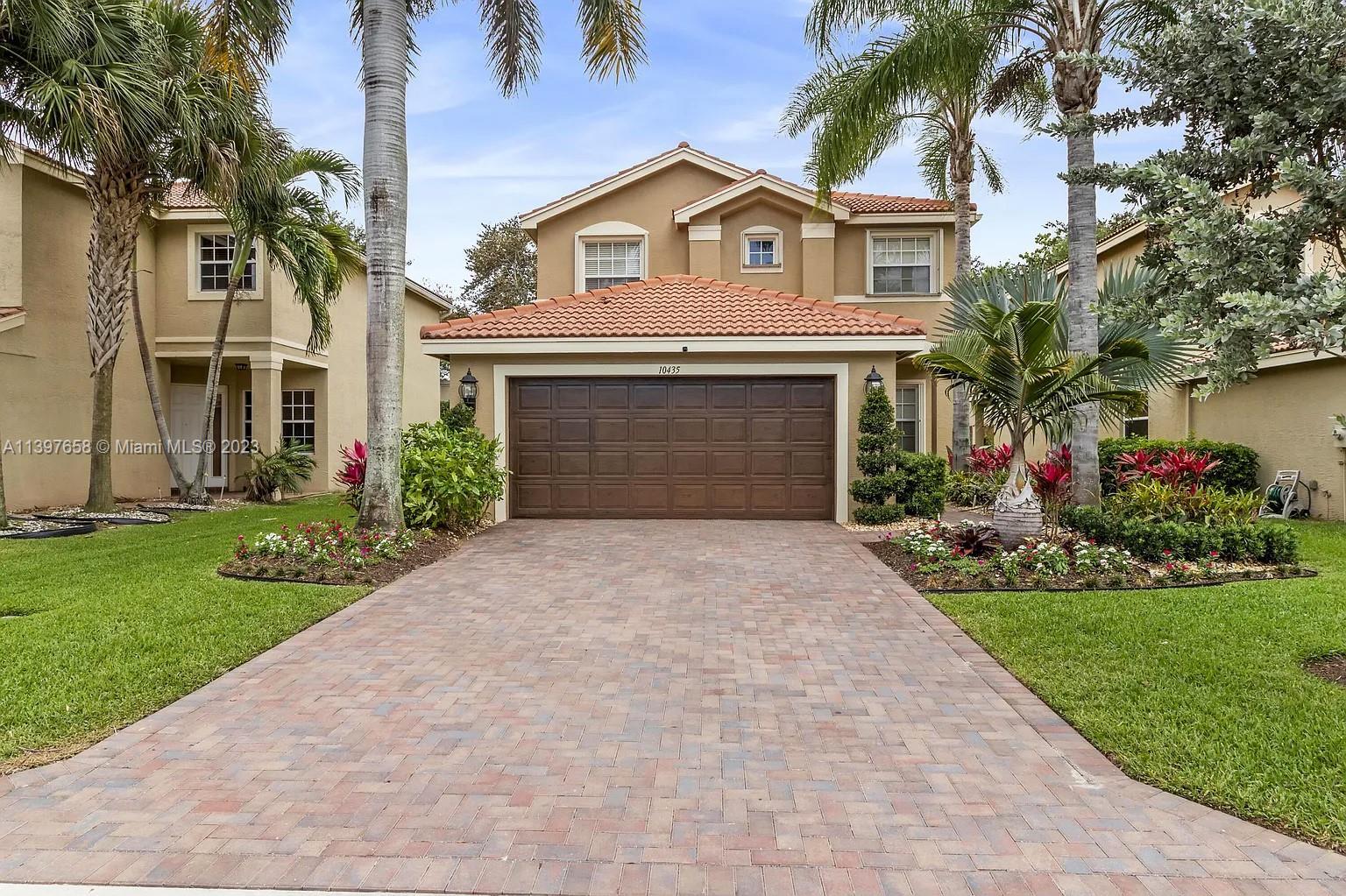 In the heart of Boynton Beach's Greystone community, this tastefully updated 3/2.5 two- story home o