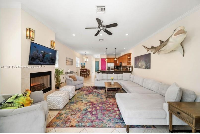 PRICE IMPROVEMENT for this 3-bed, 4-bath townhouse blending luxury, convenience, and coastal living.