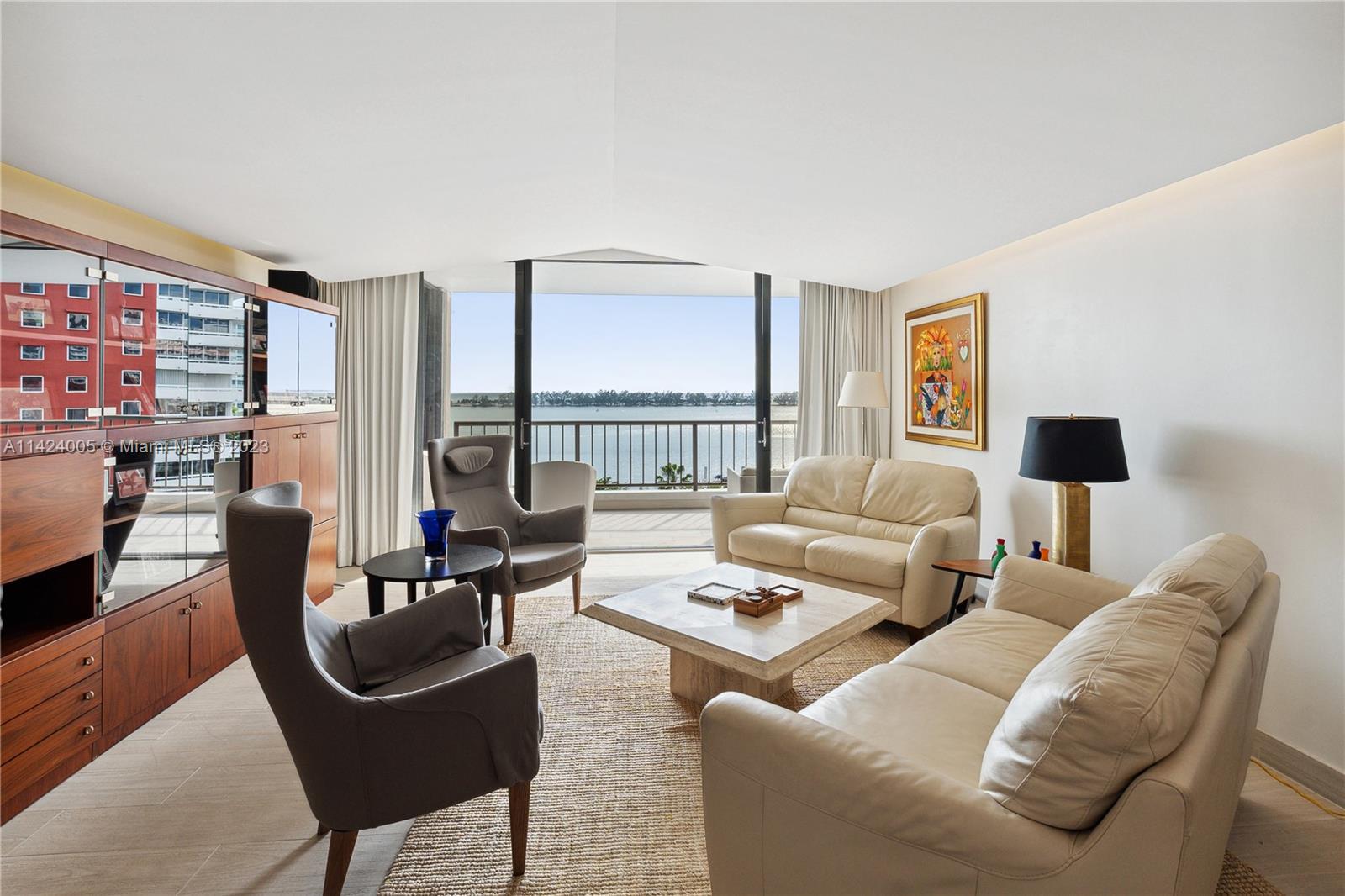 Step into this rarely available 02 line, 2 bed + den / 2 bath with direct bay views in the exquisite