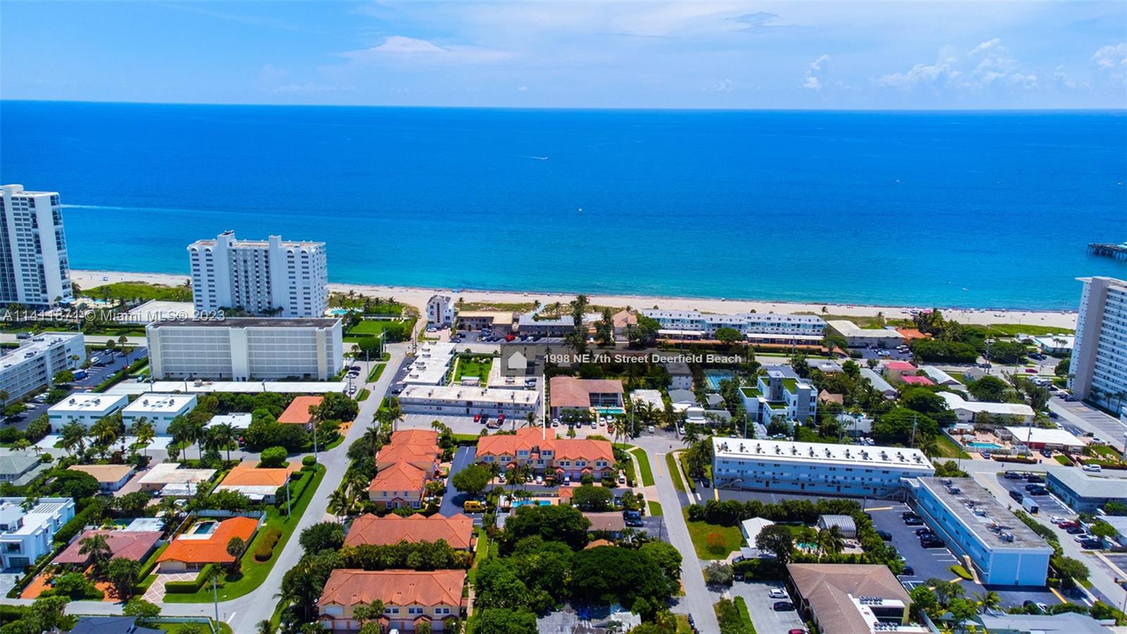 Wow Incredible LOCATION  Boca/Deerfield  Like New Townhome Tri Level approx 50 feet to the ocean Hoa
