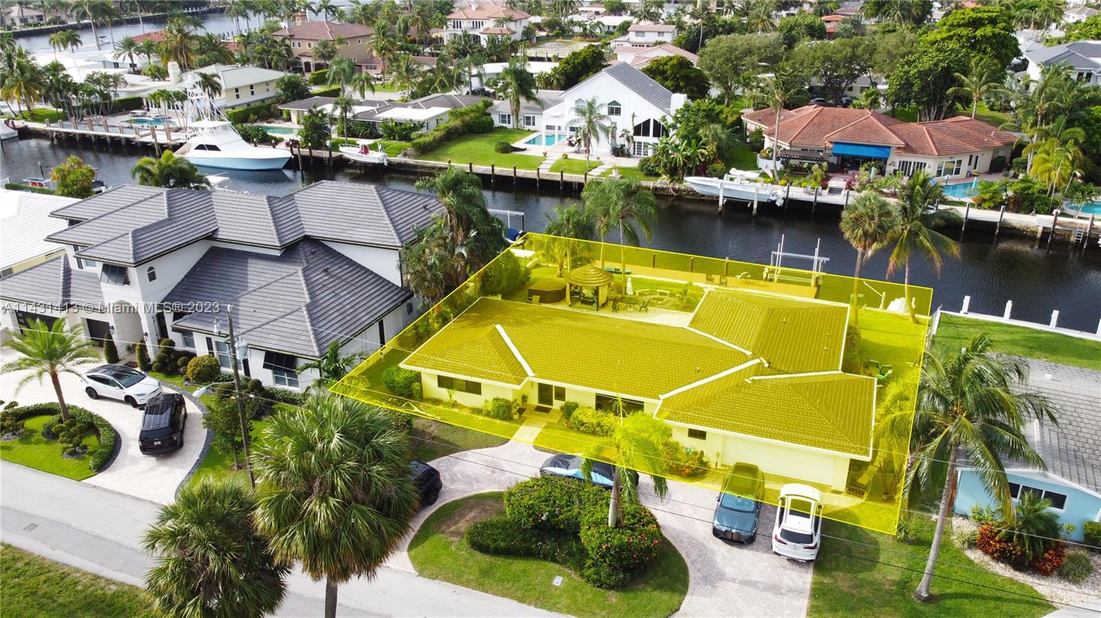 Welcome to this exceptional waterfront home in Pompano Beach, ideally situated in the sought-after H