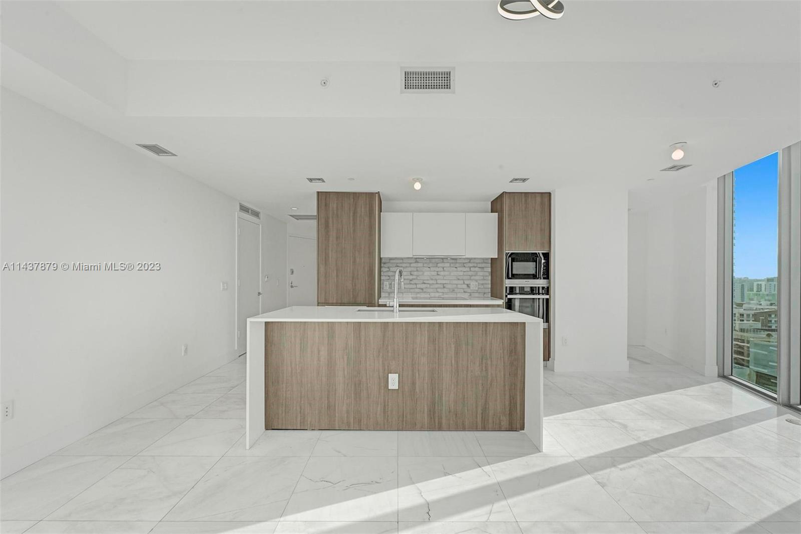 Stunning 2 bedroom 2.5 bath unit at Biscayne Beach. Floor-to-ceiling windows, blackout shades, priva