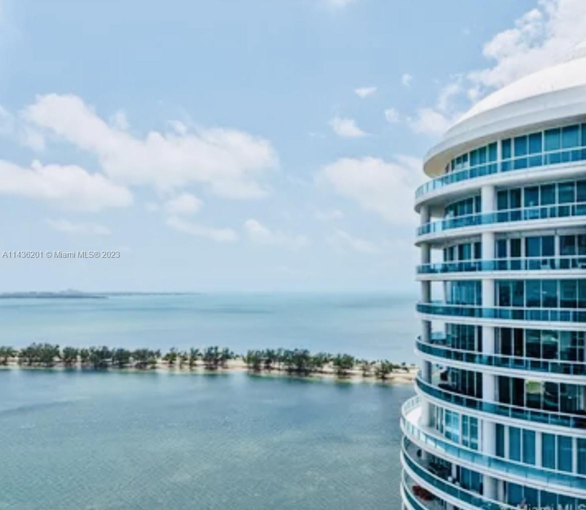 SPECTACULAR 2 BED/2 BA WITH GORGEOUS WATER AND CITY VIEWS. SPLIT FLOOR PLAN, WOOD FLOORS, KITCHEN WI