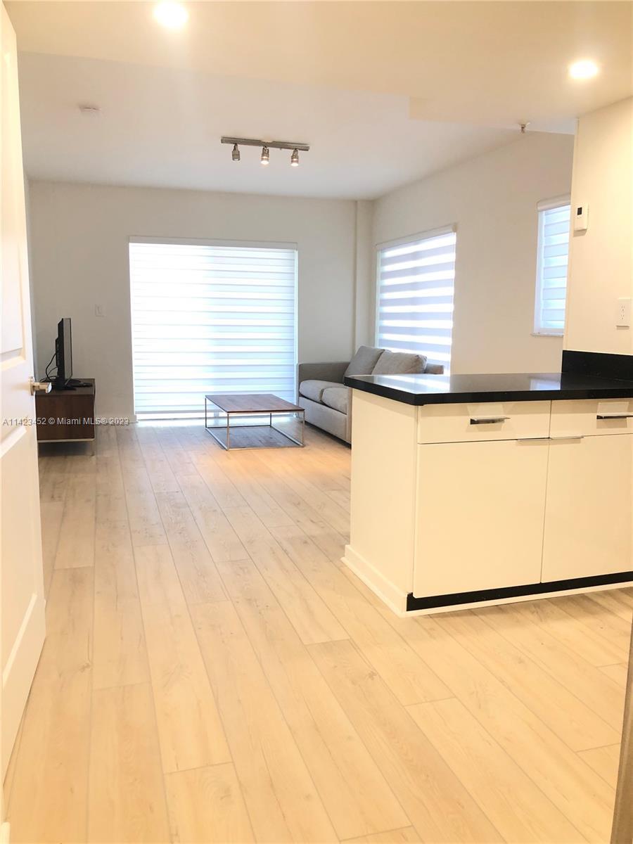 COMPLETELY REMODELED AND TASTEFULLY FULLY FURNISHED, SPACIOUS 1 BEDROOM 1 BATHROOM AND 1/2 BATHROOM 
