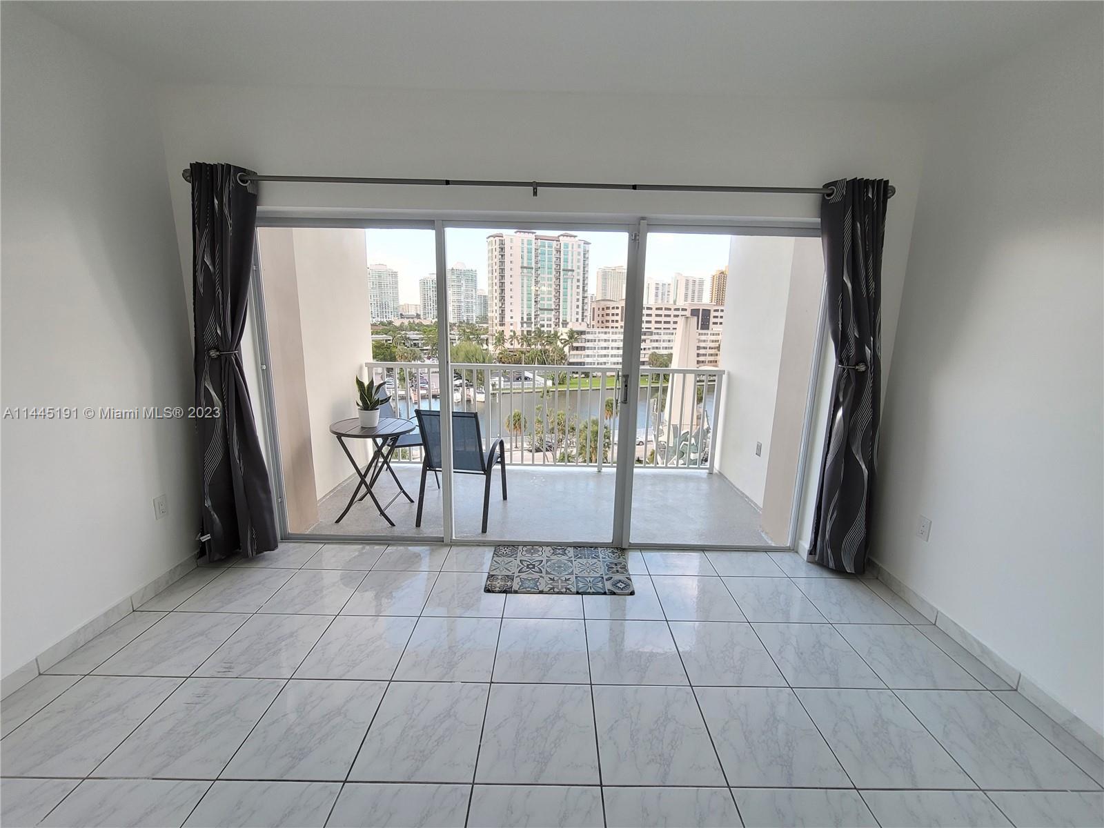 Updated & Spacious 1 bed/1.5 baths condo with new tile floors throughout, updated kitchen & bathroom