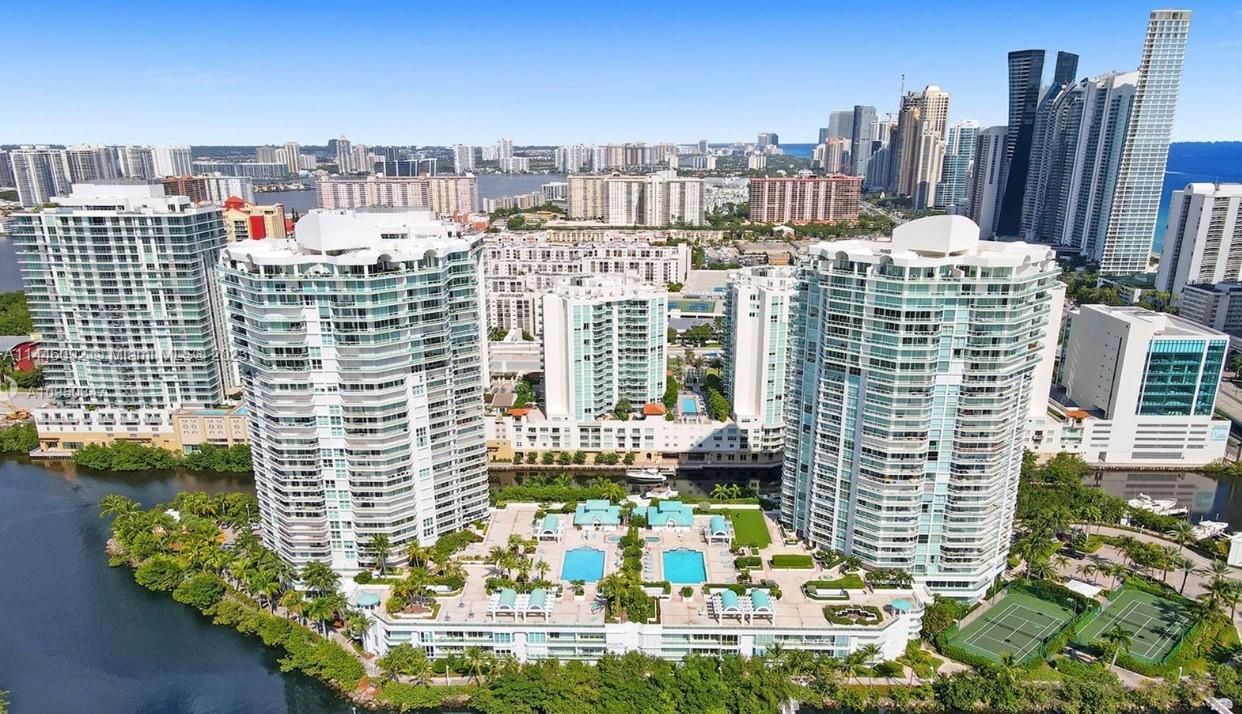 Located on an exclusive private island on Sunny Isles, with wrap around balcony and views of the mar