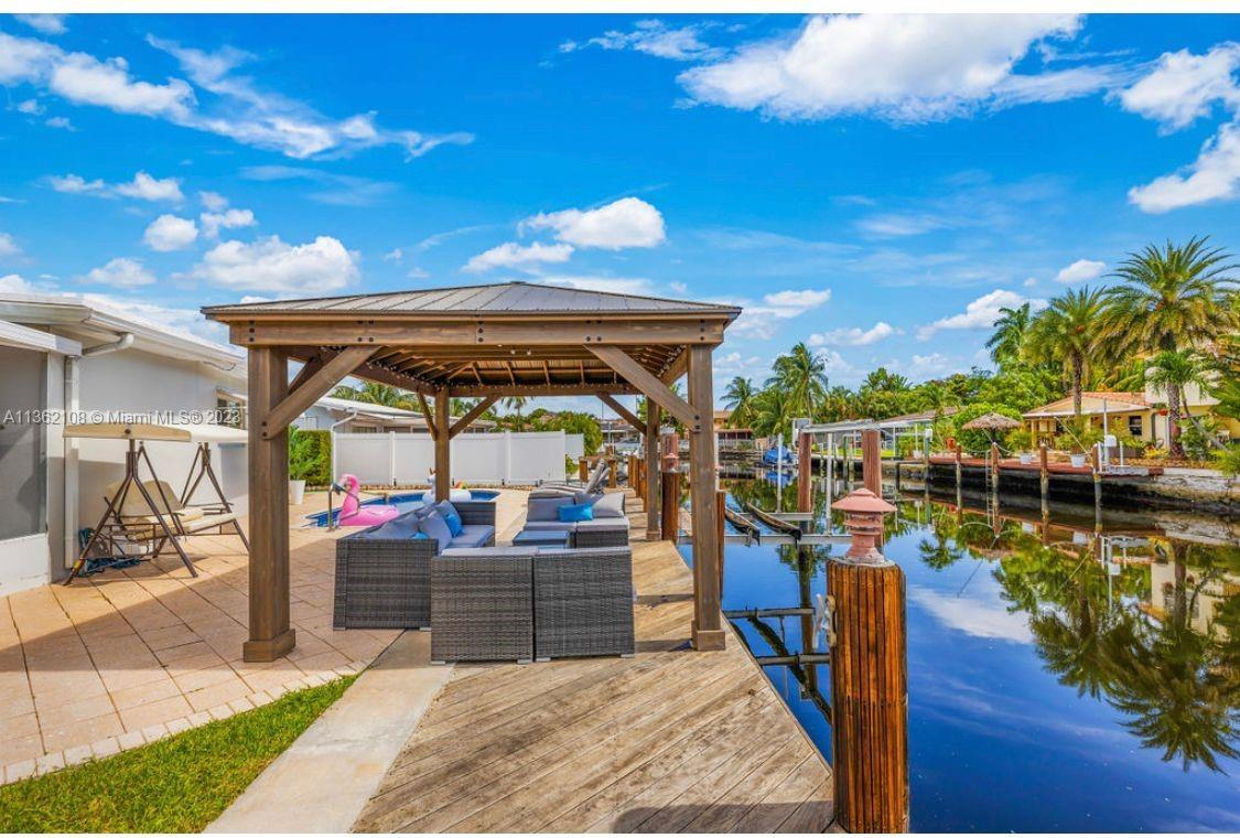 Beautiful Waterfront luxury villa featuring 3 BR & 2.5 BA, pool and 75' of waterfront. Updated kitch
