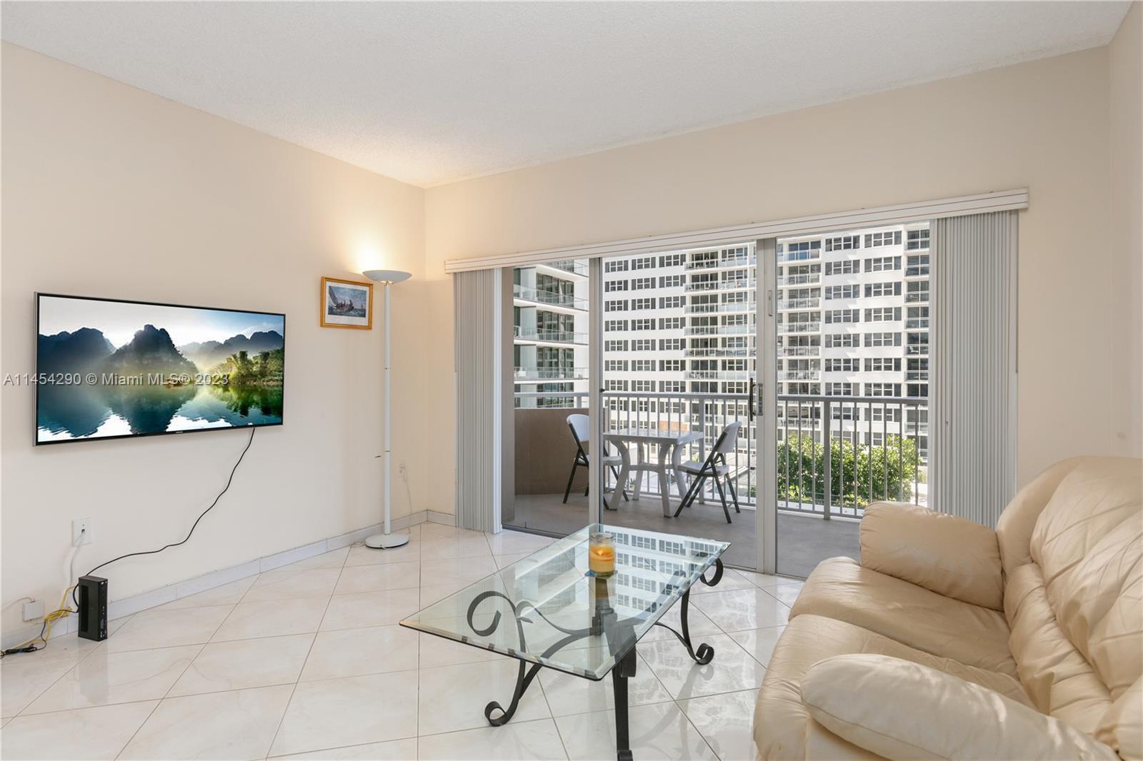 Welcome to this bright and charming 1-bd, 1.5-ba condo featuring tile flooring throughout. This apar