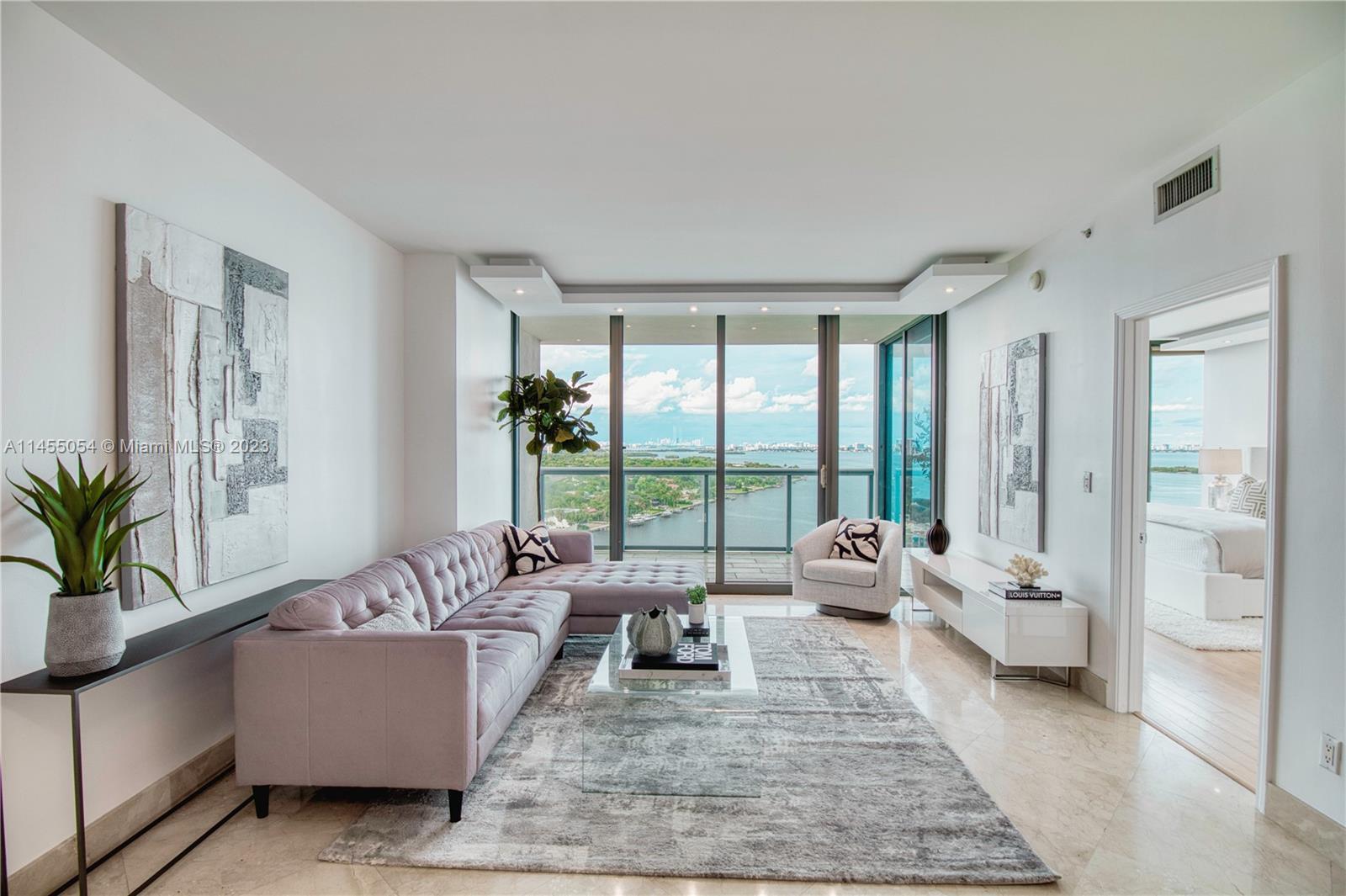 Live Limitlessly in this delightful 18th floor unit at Blue Condo overlooking Biscayne Bay & City vi
