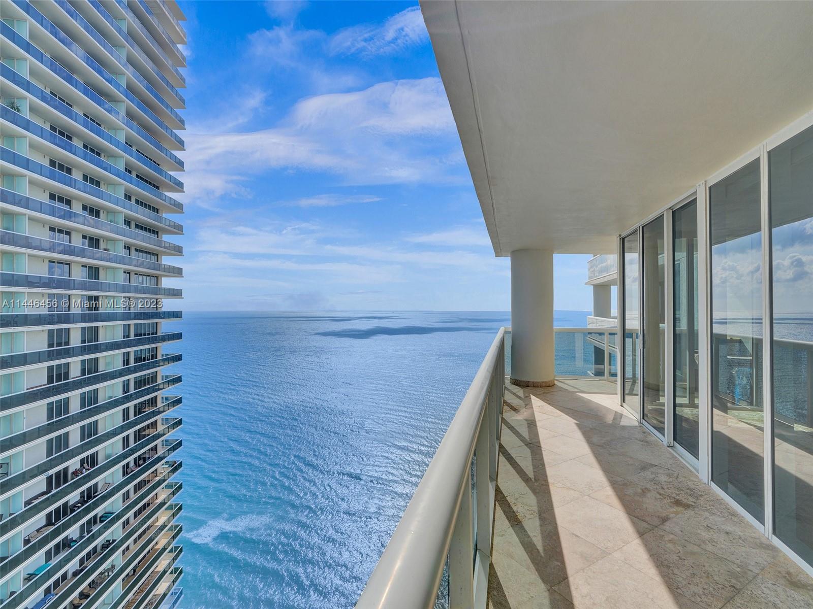 Expansive 2-bed 2-bath corner unit on the 39th floor of the renowned Beach Club. Revel in awe-inspir