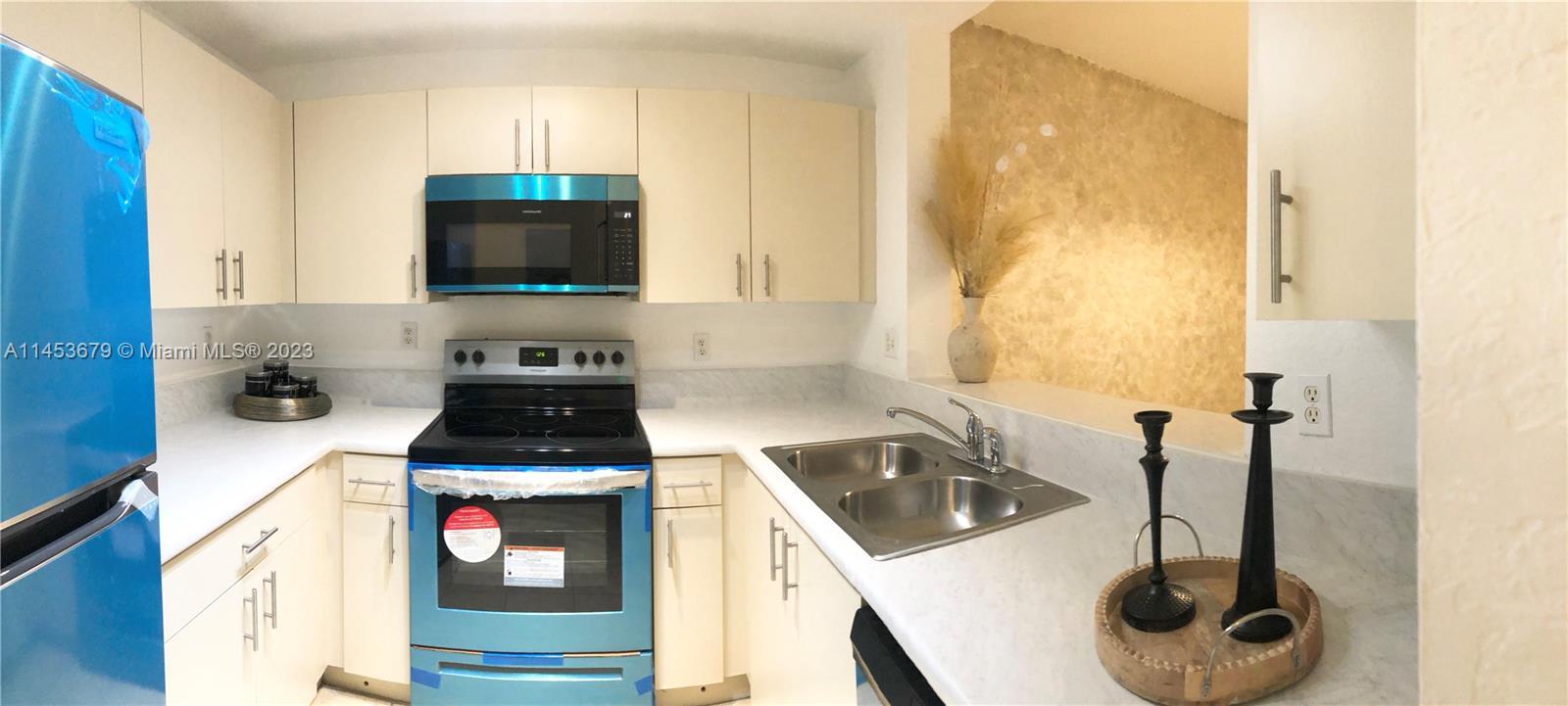 Photo of 2941 Riverside Dr #206 in Coral Springs, FL