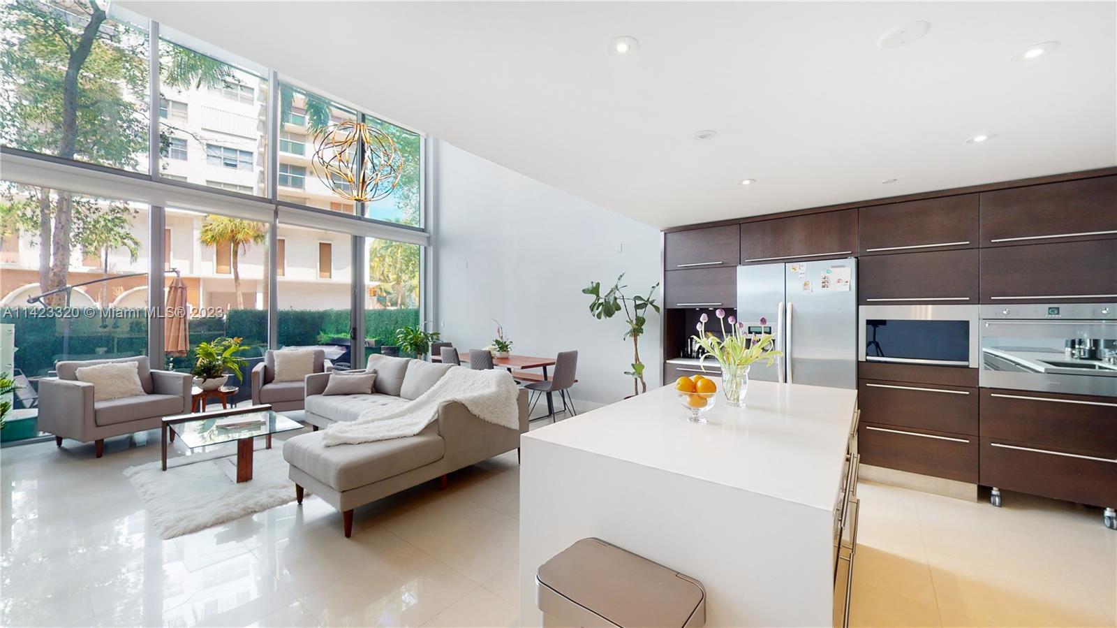Turnkey luxurious remodeled condo, unique amongst it's kind. Featuring 2 Bedrooms + Den (converted t