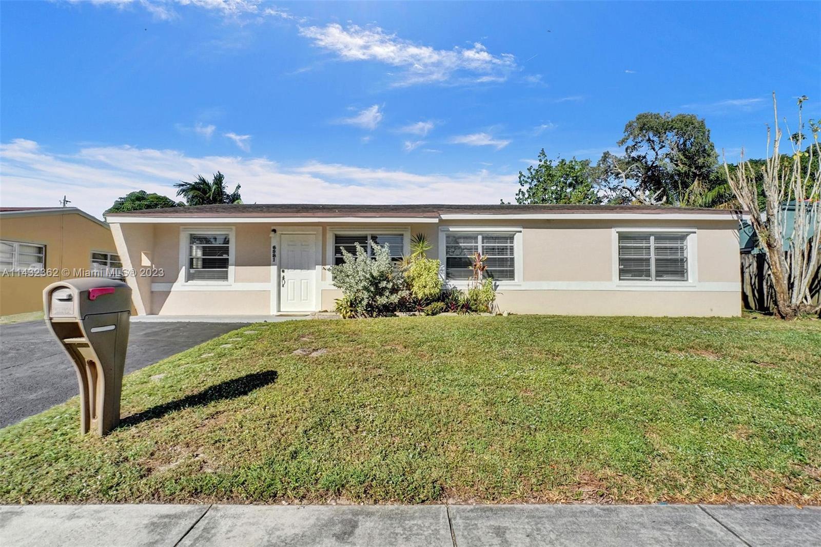 Introducing 6981 Scott St., a charming residence nestled in the heart of Hollywood, FL. This invitin