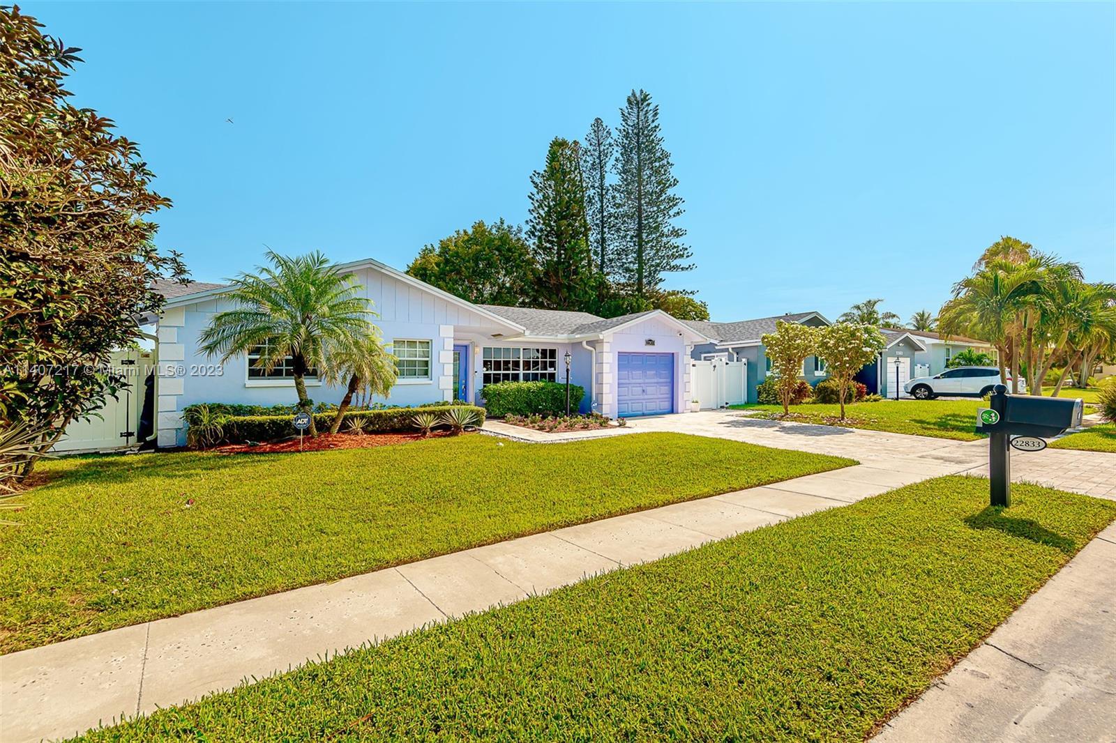 Lovely, very cozy and highly updated home in Sandalfoot Cove of West Boca. 3 bedroom & 2 full bathro