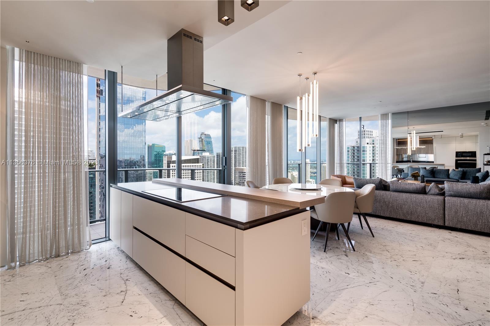 Live in ultimate luxury at this immaculate PH condo at the prestigious Brickell Flatiron. Fully cust